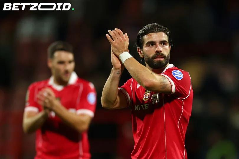 Elliot Lee Says Goodbye to Wrexham in Emotional Open Letter After Mutual Departure.